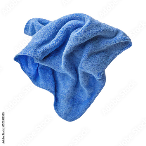 A crumpled, light-blue cleaning cloth, isolated on black