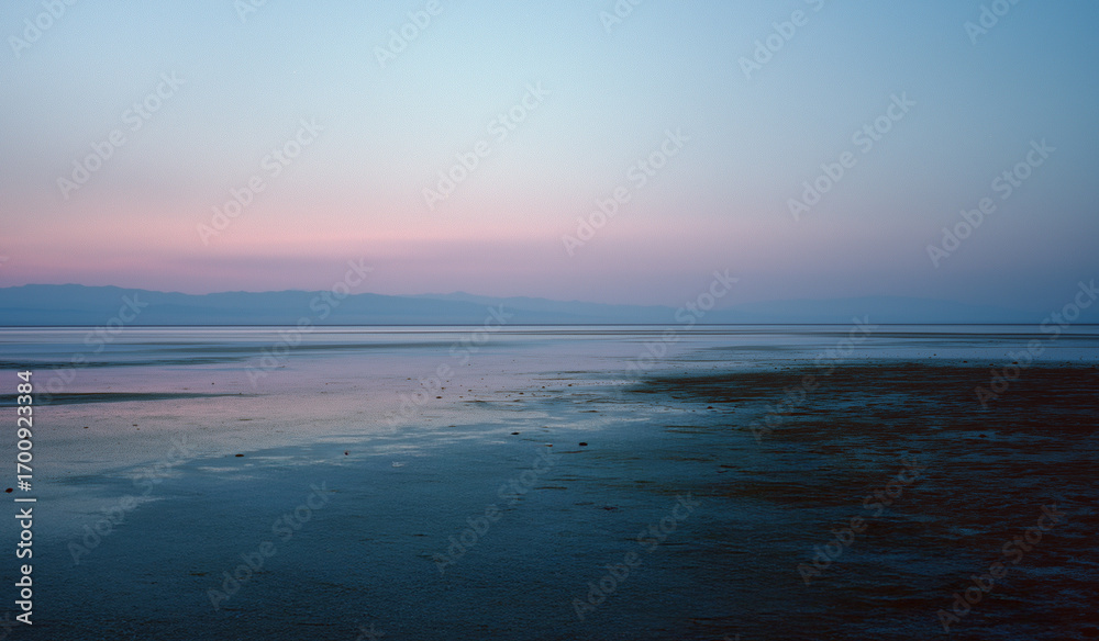 Fototapeta premium Pink and blue gradient sunset over lake- alm scenic background 