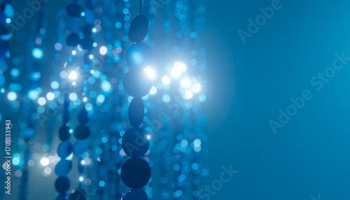 Blue glistening and sparkling party decoration hanging with bokeh effect
