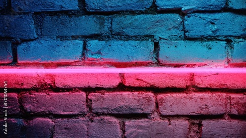 Neon pink line on a blue and rose-toned brick wall