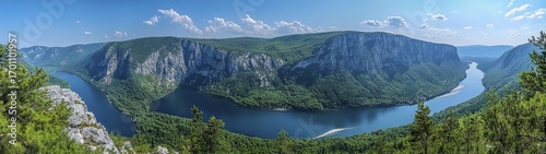Panoramic view of the Danube River flowing through a lush, green valley.