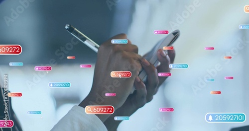 Wallpaper Mural Woman wearing white shirt holding smartphone and stylus in office, with digital tags and icons Torontodigital.ca