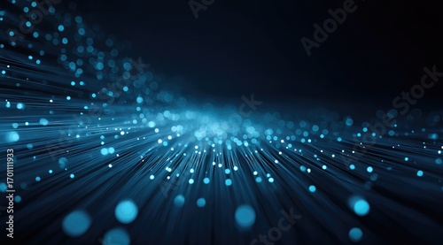 Abstract digital flow. Deep blues and light-blue particles streak across a dark background