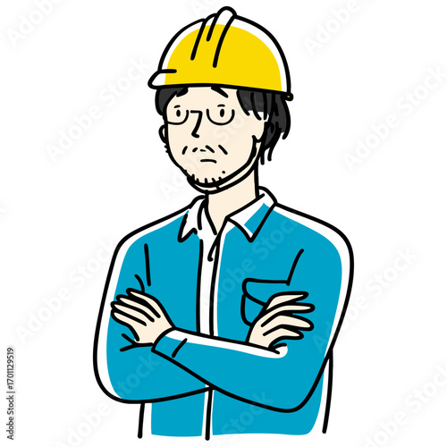 Construction worker in yellow helmet with rough worried expression crossing arms  
