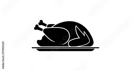 A black silhouette of a roasted chicken on a serving platter, ready to be eaten.