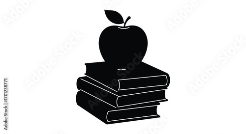 an apple sits atop a stack of books neatly arranged