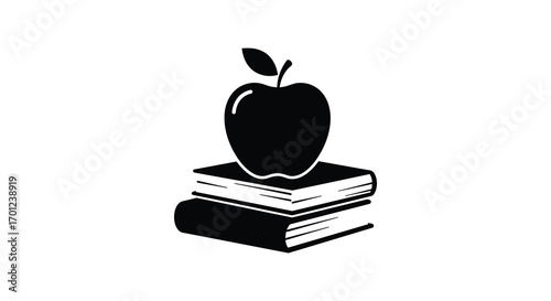 an apple resting atop two stacked books
