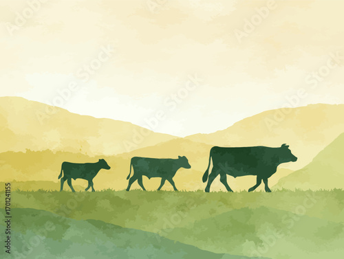 A group of three cows strolls along a grassy field against a backdrop of soft yellow hills and a gentle sunrise. The peaceful rural scene evokes tranquility.