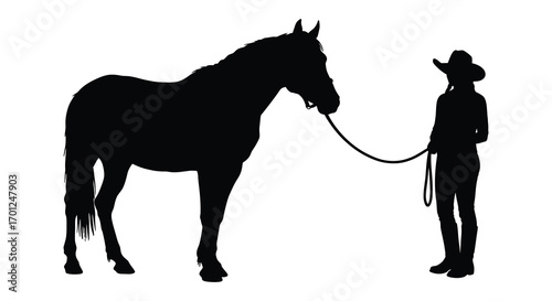 a cowboy stands beside his loyal horse in silhouette