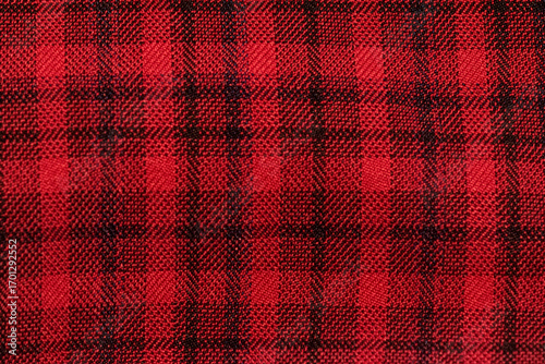 Fotografie Classic red and black plaid cloth fabric close-up texture