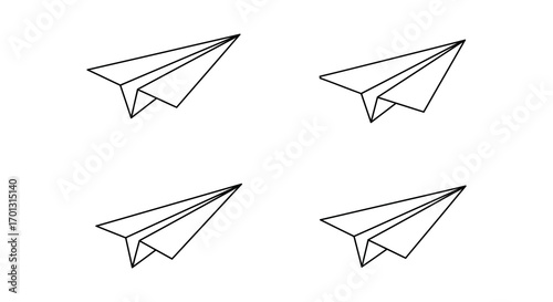 four paper airplanes arranged neatly in a square formation