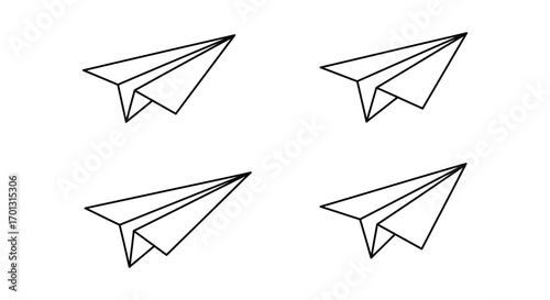 four simple paper airplanes arranged neatly in a square