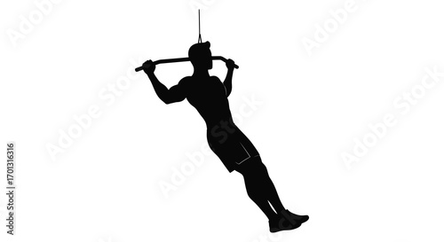 a silhouette figure performing aerial acrobatics with ropes