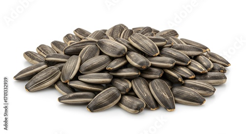 Pile of sunflower seeds isolated on white background for food and nutrition