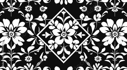 Symmetrical floral pattern with a diamond shape in the center, featuring white flowers and leaves on a black background.