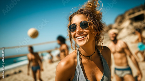 Fototapeta Naklejka Na Ścianę i Meble -  young woman with  on the beach  in bikini young woman on the beach with a ball