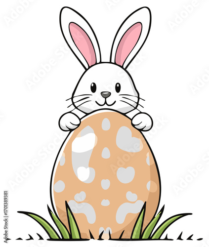 Easter bunny holding spotted egg in grass, Easter decoration