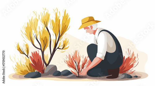Man planting autumn shrubs
