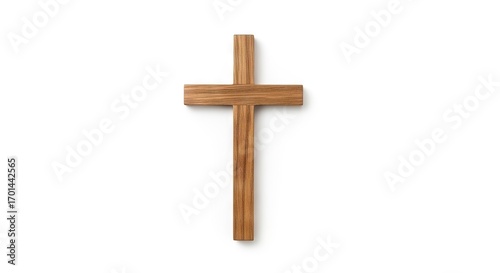 A simple wooden cross lies centered against a stark white background