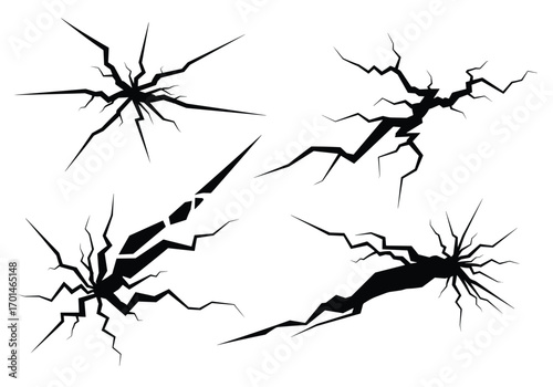 Set of four cracked surface vector graphics in black and white