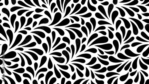 Seamless black and white abstract floral pattern with organic teardrop shapes and flowing curves