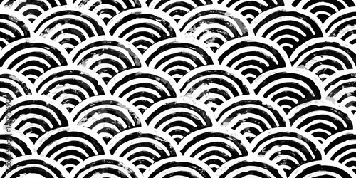 Abstract black and white seamless pattern of stylized scallop shells or waves
