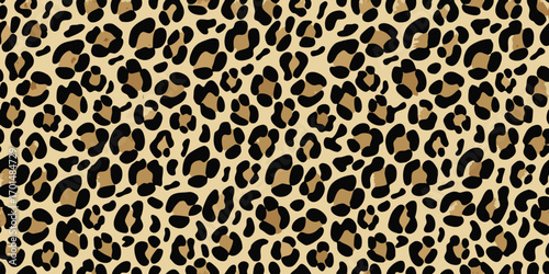 Seamless leopard print pattern with black and tan spots on a light beige background