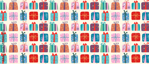 Festive seamless pattern of colorful gift boxes with ribbons. Great background for Christmas, birthday, holiday and special occasion.