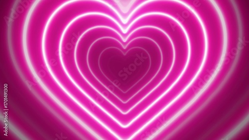 Bright pink neon heart shape tunnel animation with concentric rings and dark background image photo