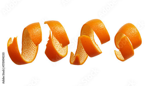 orange peels flying in the air on a white background, in a flat lay composition. isolated orange peel spirals flying in different directions, set against a transparent png background. flat lay. 