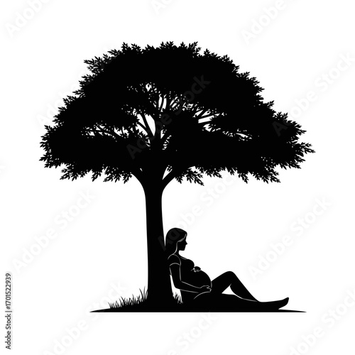  pregnant woman resting under a tree