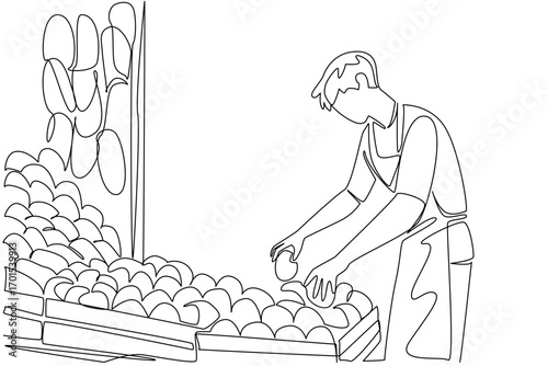 Single continuous line drawing man wearing apron is tidying up the fruit he is selling at his stall. Trader activities in the morning. National Small Business Day. One line design vector illustration
