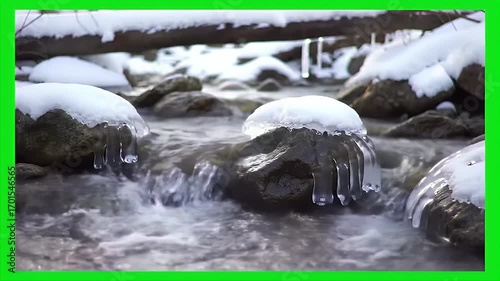 Abstract depiction of rocks and water in a surreal setting.