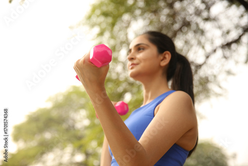 Stock Image Of A Female Lifting Weights
