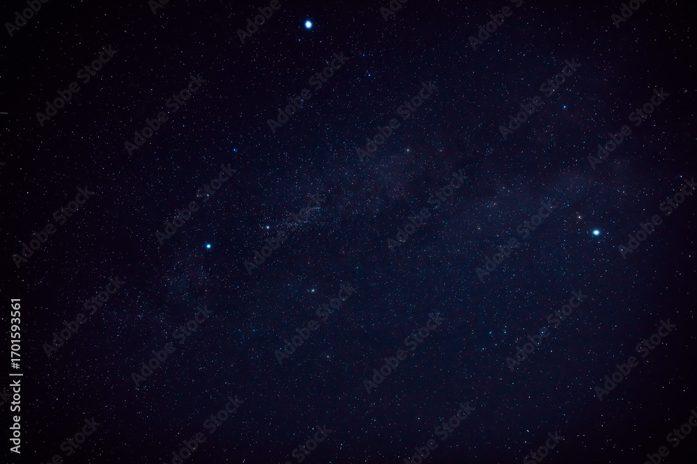 Fototapeta premium Milky way stars and constellations with a galaxy background.