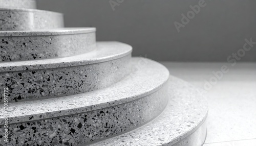Desaturated terrazzo stair nosing curve with soft edge and copy space on the right modern material background for architecture branding and interior design