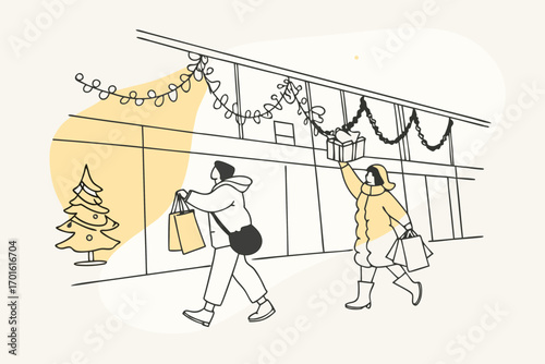 People in winter clothing carrying shopping bags and a gift box while walking past a decorated christmas tree and festive lights outside a building