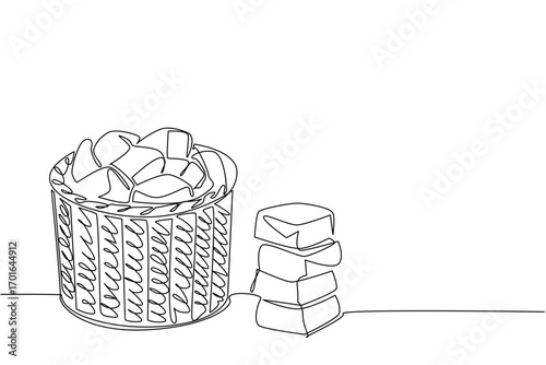 Continuous one line drawing buttermilk biscuit in rattan wicker container. Display food. Can be brought as souvenirs. National Buttermilk Biscuit Day. Single line draw design vector illustration