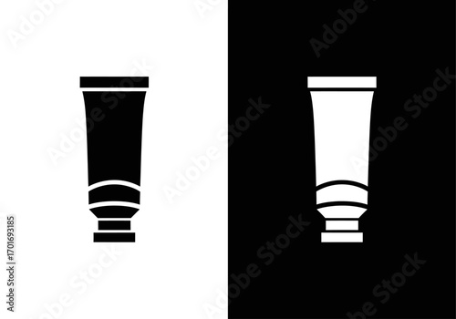 Contrast of cosmetic tubes : A visually arresting composition of a cosmetic tube in bold black and white, symbolizing beauty, skincare, and personal care.