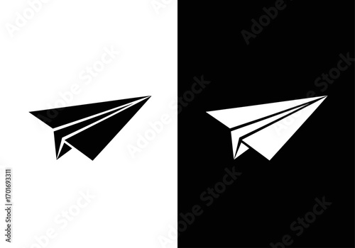 Paper Airplane Silhouette: A minimalist graphic showcasing a black and white paper airplane, symbolizing flight, freedom, and imagination.