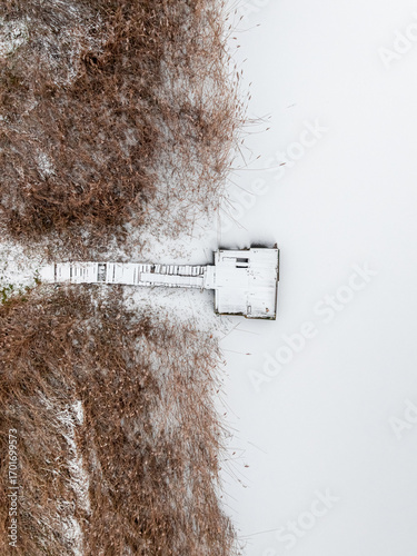 Flying above snow-covered l...