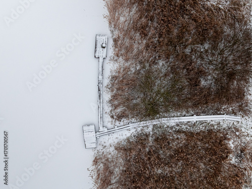 Aerial view of snowy bridge...