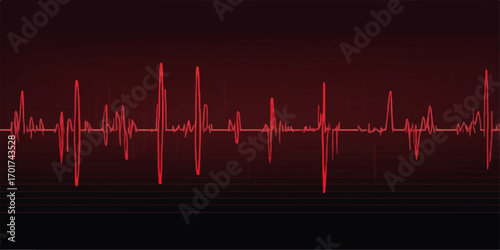 A cardiogram graph on a medical monitor displays a red heartbeat pulse wave