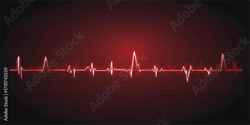 An EKG line showing a healthy heartbeat on a medical monitor