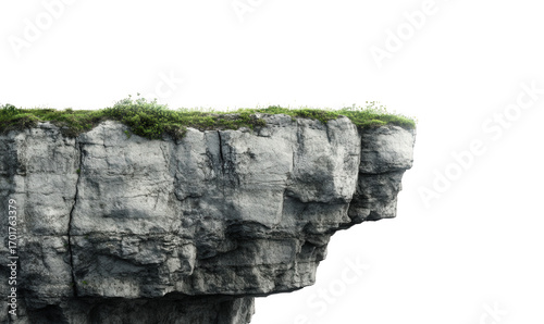A detailed rock cliff with grass isolated on transparent background
