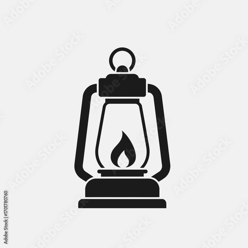 Vector art of black silhouette of an oldfashioned oil lantern with a flame
