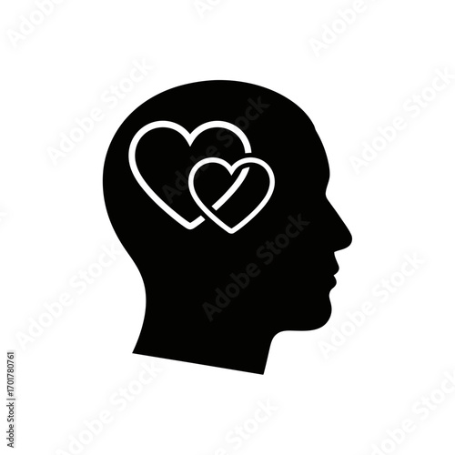 Vector art of silhouette of a human head with two intertwined hearts inside