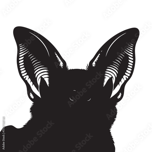 Silhouette of a bat head the bat has large ears and a dark face, creating a mysterious and intriguing image the simple design makes it versatile