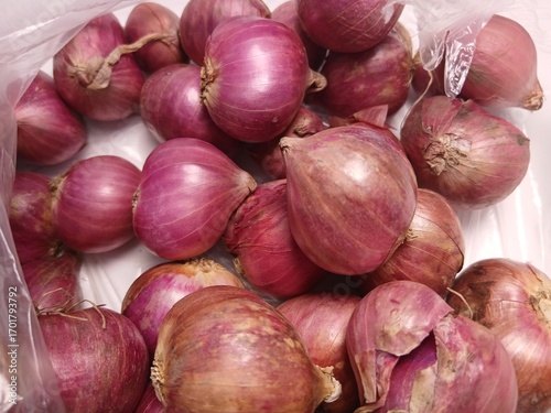 Red onion isolated on white background