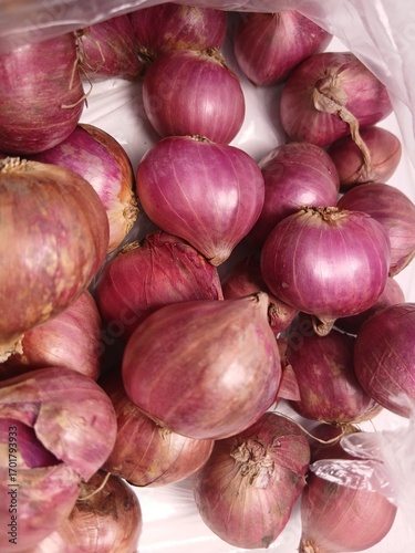 Red onion isolated on white background